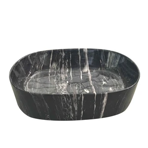 כיור מונח אובלי בשחור שיש